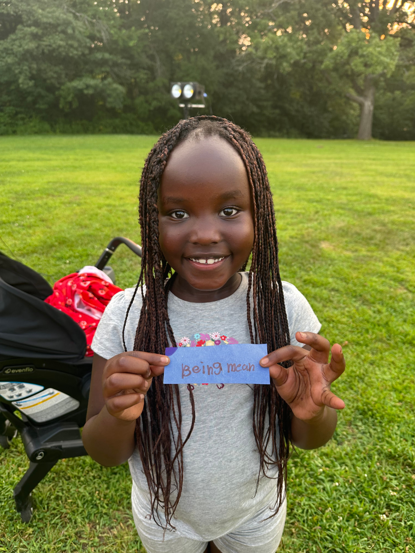 A camper holding a slip of paper she chose to let go of